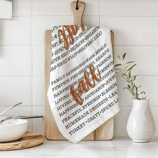 fall lettering towel perfect for pumpkin spice coffee station
autumn phrases tea towel hanging from cabinet handle
fall themed hostess gift with typography kitchen towel
cozy season cotton towel for cider bar and snack table