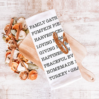 Wholesale fall phrases flour sack towel rolled in kitchen gift basket
seasonal word collage towel for autumn table décor
fall script towel accenting white farmhouse kitchen
autumn words tea towel next to pie and cinnamon sticks in bulk