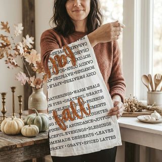 autumn kitchen towel Wholesale with words bonfires hayrides corn mazes
cozy fall words tea towel for coffee bar decor
football and chili fall words kitchen towel
flour sack fall towel featuring seasonal word collage