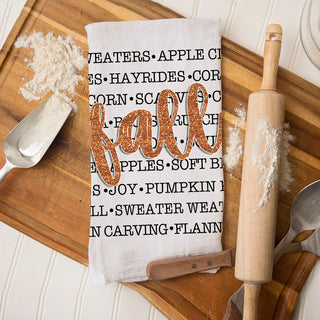 autumn kitchen décor towel with harvest inspired phrases
fall words dish towel styled with mini pumpkins and leaves
cozy fall slogan towel for modern neutral kitchen
autumn kitchen hand towel featuring favorite fall activities