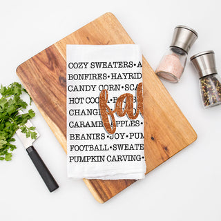 autumn kitchen towel Wholesale with words bonfires hayrides corn mazes
cozy fall words tea towel for coffee bar decor
football and chili fall words kitchen towel
flour sack fall towel featuring seasonal word collage