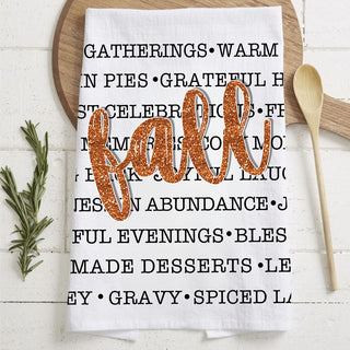 fall word art kitchen towel hanging on oven handle
autumn text towel with cozy sweaters apple cider pumpkin pie
fall kitchen décor towel with glitter style fall lettering wholesalers