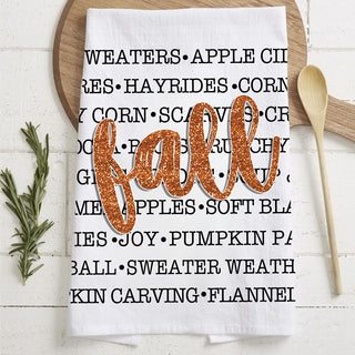  Makes an easy fall hostess gift or housewarming present for anyone who loves sweaters, cider and all things cozy.
fall words flour sack kitchen towel
autumn typography dish towel with glitter fall script
cozy fall phrases kitchen towel for farmhouse décor
white cotton fall tea towel with word art design