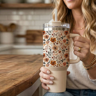 cute fall floral tumbler for women
autumn flower cup with handle and straw
neutral floral pumpkin spice tumbler
fall wildflower aesthetic tumbler
cozy floral iced coffee cup
large autumn floral travel mug
fall botanical tumbler aesthetic
neutral cottagecore tumbler cup
warm floral autumn drinkware
trendy floral fall coffee tumbler