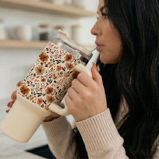 fall bouquet tumbler aesthetic
beige autumn floral cup
cute floral gift for women
fall flower aesthetic drinkware
neutral pumpkin spice cup
cute oversized floral tumbler
autumn floral coffee cup
fall travel tumbler for women
cozy flower tumbler aesthetic
floral cup with reusable straw
cute boho fall tumbler