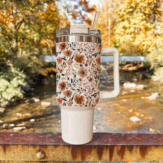 autumn cottagecore tumbler
floral pumpkin patch tumbler
fall garden aesthetic cup
cute floral cup for women
oversized floral coffee tumbler
fall aesthetic travel mug
neutral cozy season cup
autumn floral tumbler gift
cozy flower coffee tumbler