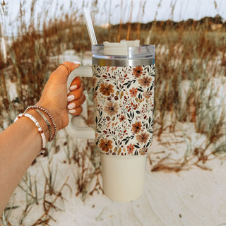 oversized floral tumbler aesthetic
minimal botanical autumn tumbler
cute boho pumpkin spice cup
warm neutral flower travel cup
fall floral tumbler for iced coffee
cozy autumn wildflower tumbler
neutral farmhouse floral drinkware
cute floral tumbler for teachers
trendy cozy season tumbler cup