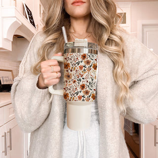 cozy farmhouse autumn tumbler
cute floral tumbler for commuters
fall inspired botanical tumbler
floral cup aesthetic for moms
neutral autumn bouquet cup
cute flower travel mug fall
autumn garden tumbler aesthetic
cozy neutral floral water cup
large handled floral coffee tumbler
