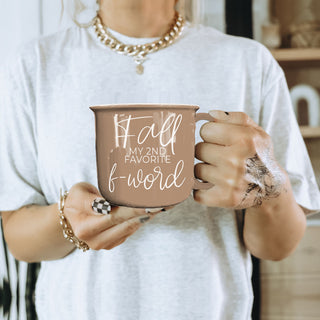 funny fall coffee mug with playful script text
autumn latte mug for pumpkin spice and cozy nights
cheeky fall quote coffee cup for sarcastic women
fall humor mug next to pumpkin and sweater
neutral brown fall mug perfect for seasonal coffee bar