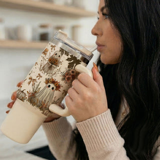 neutral floral pumpkin tumbler
ghost tumbler with autumn flowers
cozy halloween coffee tumbler
cute ghost tumbler for fall
neutral spooky girl tumbler
ghost tumbler aesthetic for coffee lovers
cottagecore ghost coffee cup
cute cozy season tumbler
neutral haunted aesthetic tumbler