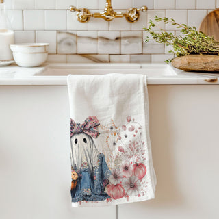 pink ghost kitchen towel for non scary halloween décor
floral ghost hand towel perfect for autumn gifting
cute spooky season towel with girly ghost and florals
ghost holding pumpkin flower basket fall dish towel
whimsical ghost with flower crown towel for fall décor lovers