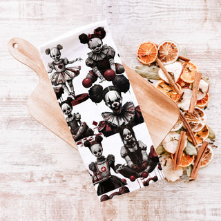 creepy doll face flour sack towel spooky house décor
evil clown halloween tea towel for haunted bar cart
scary doll and clown gift towel for october birthdays