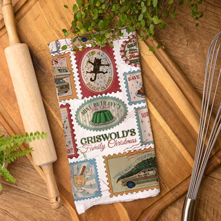 woman holding funny griswold christmas kitchen towel outdoor holiday setting
funny christmas vacation kitchen towel flat lay wooden board farmhouse decor
close up funny holiday movie quote kitchen towel vintage christmas design
festive farmhouse kitchen towel christmas decor cozy holiday home