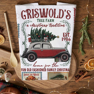 christmas kitchen towel with vintage holiday car and tree
retro station wagon christmas dish towel decor
holiday towel with classic christmas road trip theme
festive kitchen towel with christmas tree on car design
nostalgic christmas decor towel vintage holiday scene