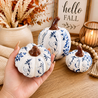 Blue and white pumpkins for sophisticated fall decor
White pumpkins with blue floral artwork
Blue and white decorative pumpkins for Thanksgiving table
Chinoiserie pumpkins for entry table styling
Blue and white pumpkins for decorative tray styling