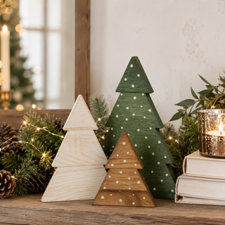 Wooden holiday figurines for a Christmas village display
Christmas tree accents for a rustic holiday centerpiece
Natural wood Christmas décor with hand-painted snow details
Decorative wooden trees for a holiday dining table
Green and white Christmas tree décor for a cozy home
Freestanding wooden tree decorations for seasonal displays
Boxwood trees styled with red berries and evergreen garland
Christmas console table décor with rustic wooden trees