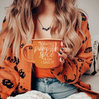Wholesale funny halloween mug for people who hate pumpkin spice
orange fall mug with bold white lettering
funny fall coffee cup on cozy table setup