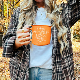 funny seasonal mug with minimalist fall styling
orange mug with fall candle and mini pumpkins
cozy living room setup with sarcastic fall mug