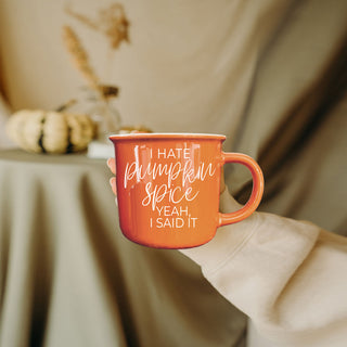 autumn flatlay with leaves notebook and funny mug
fall mug for realist who hates pumpkin flavor
orange mug on desk with autumn planner and pen