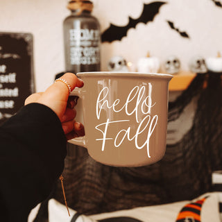 hello fall mug for fall tiered tray styling
hello fall neutral mug with candle and greenery
hello fall mug on white marble countertop