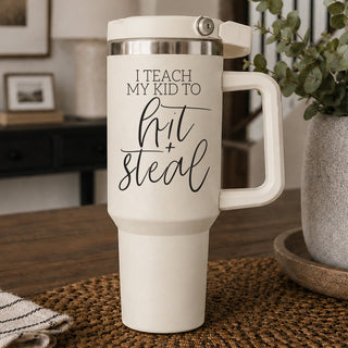 Travel mugs for sports moms, funny sport mom gifts, tumblers with lid
baseball mom strategy wisdom tumbler
softball parent teaching moments cup
sports mom life lessons drinkware in bulk