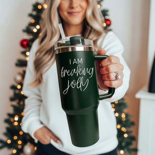 Two insulated travel mugs, one green and one red, with humorous text on a white background.
Leak proof holiday tumbler - I am freaking jolly 40oz Christmas
Durable Christmas tumbler - I am freaking jolly red green 40oz
