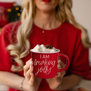 red mug filled with marshmallows
Christmas cocoa mug with whipped cream
festive mug near Christmas tree
holiday coffee cup cozy sweater
Christmas lights coffee mug photo
winter morning coffee aesthetic
cozy Christmas blanket coffee mug