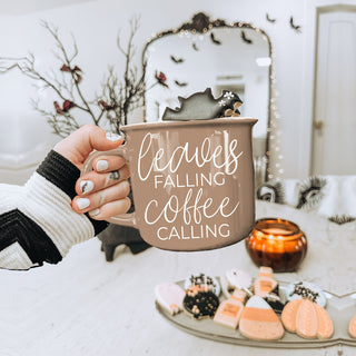 autumn coffee mug gift for her leaves and coffee design
brown fall mug with script leaves falling coffee calling
neutral farmhouse fall mug for kitchen decor
leaves and coffee themed autumn drinkware