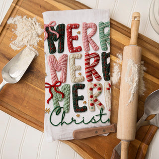pink nutcracker kitchen towel styled on wood board with holiday decor
merry christmas pink towel with knit lettering and festive accents
cute ballet nutcracker christmas towel flat lay kitchen styling
pink christmas towel aesthetic cozy holiday kitchen scene
feminine holiday kitchen towel with nutcracker and tree design