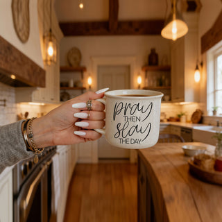 lifestyle photo of woman with pray then slay mug
Christian coworker gift pray then slay coffee cup
inspirational drinkware for Christian women
cute Christian mug for desk at work
coffee bar decor mug with pray then slay saying
Christian birthday gift mug for her
neutral farmhouse style Christian quote mug
script font pray then slay the day design
Christian self care morning coffee cup