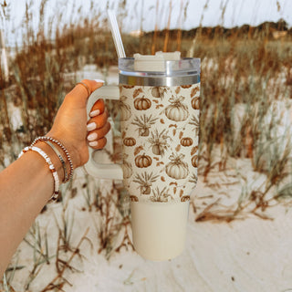 pumpkin leaves insulated tumbler
cute pumpkin spice travel mug
warm beige pumpkin cup
pumpkin coffee station cup
cozy autumn hydration tumbler
neutral pumpkin gift for coffee lovers
pumpkin tumbler aesthetic for moms
cute fall cup with pumpkins