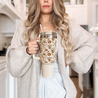 neutral pumpkin aesthetic tumbler
cute warm toned tumbler
autumn leaves pumpkin cup
cozy pumpkin coffee aesthetic
pumpkin tumbler for teachers
fall road trip coffee tumbler
neutral cream pumpkin tumbler
cute pumpkin water tumbler
autumn inspired coffee cup