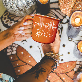 cozy thanksgiving morning coffee in orange autumn mug
autumn color pop mug in neutral living room decor
fall and halloween hosting essentials with orange mug