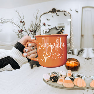 spooky cute halloween coffee cup
cozy cabin fall mug for weekend getaway
autumn self care night mug with warm drink
fall decor accent mug on coffee table
halloween themed drinkware for hot chocolate