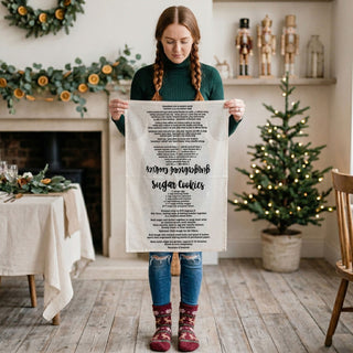festive function to your kitchen with this Christmas kitchen towel featuring a classic gingerbread cookie recipe. Made from soft, absorbent flour sack cotton, this decorative holiday dish towel is perfect for baking, decorating, and gifting to bakers and home decor lovers.