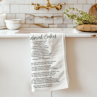 christmas kitchen towel unusual baking accessory
festive towel unique christmas kitchen decor item
holiday baking towel creative gift for bakers
christmas towel with recipe printed for decor and use
novelty dish towel christmas baking theme