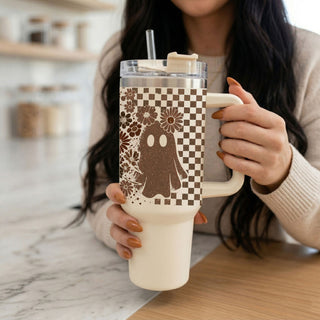 retro skull hydration tumbler
cute spooky season tumbler aesthetic gift
neutral haunted house coffee cup
ghost tumbler for teachers and moms
retro creepy cute coffee cup
cute halloween floral hydration tumbler
neutral spooky season drinkware aesthetic