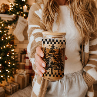 Christmas retro drinkware - festive tumbler cup for holiday entertaining
Vintage Christmas glass with retro tree artwork - 17oz tumbler gift
Buffalo plaid and tree Christmas tumbler - farmhouse holiday drinkware
Christmas retro tumbler - glass cup with bamboo lid and straw