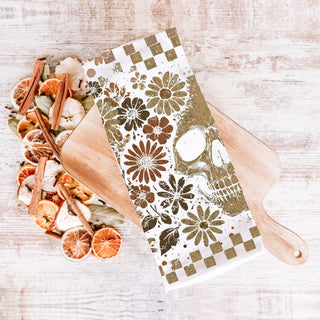 brown floral skull towel for gothic farmhouse fall décor
ghost and skull checkered towel for halloween hostess gift
neutral halloween kitchen décor towel with retro pattern