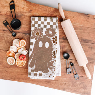 checkered skull tea towel for pumpkin spice kitchen décor
skull and floral retro towel for thanksgiving bar cart
neutral spooky skull towel for year round gothic home