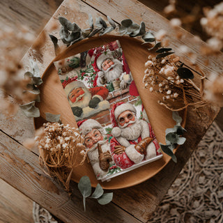 expressive Santa Claus kitchen towel holiday design
playful Santa characters Christmas dish towel
animated Santa faces festive kitchen towel
lively Santa Claus artwork kitchen linen
character style Santa holiday tea towel