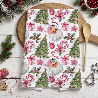 christmas santa pattern kitchen towel pink festive theme
holiday print tea towel santa claus repeating pattern
seasonal kitchen linen christmas santa and tree design
christmas themed dish towel pink and green holiday print
holiday kitchen textile santa claus and ornament design
winter christmas kitchen towel santa pattern aesthetic