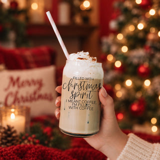 Shop this funny Christmas coffee cup featuring “Filled With Christmas Spirit, I Meant Coffee.” This 17oz glass tumbler includes a bamboo lid and metal straw and makes a cute Christmas gift for coffee lovers, teachers, coworkers and moms.
