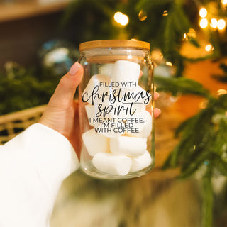 Funny 17oz Christmas glass tumbler with bamboo lid and reusable metal straw featuring “Filled With Christmas Spirit, I Meant Coffee.” A cute holiday iced coffee cup and Christmas gift for coffee lovers, moms, teachers, coworkers and friends.