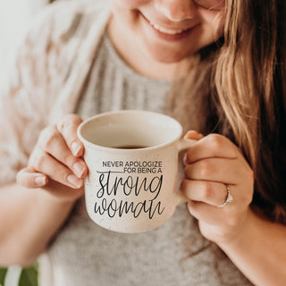 coffee mug for women who know their worth
script quote mug never apologize for strength
lifestyle photo of woman with empowering quote mug
feminist inspirational mug on white background
strong woman mug for sister birthday gift
empowerment coffee mug for wife or girlfriend
daily affirmation mug for strong independent woman