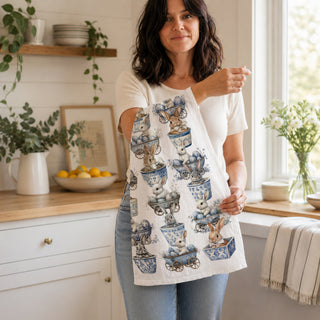 Easter rabbit in blue and white pot
bunny with Easter eggs kitchen towel
rabbit with eggs spring towel
bunny and egg cart kitchen towel
Easter bunny egg basket towel
spring bunny egg decor
rabbit with speckled eggs tea towel
Easter bunny and flowers kitchen towel
bunny and blossoms spring towel
spring rabbit floral kitchen towel
bunny and greenery Easter towel
Easter rabbit floral arrangement towel
Easter kitchen towel lifestyle image
spring kitchen towel lifestyle photo
blue white bunny towel lifestyle ima