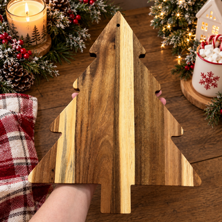 holiday appetizer serving board
Christmas tree cheese board
wooden holiday charcuterie board
Christmas appetizer platter bulk
Christmas tree serving platter wholesaler
Christmas acacia board displayed with candles and tabletop trees
Festive wooden serving board standing on a rustic kitchen shelf
