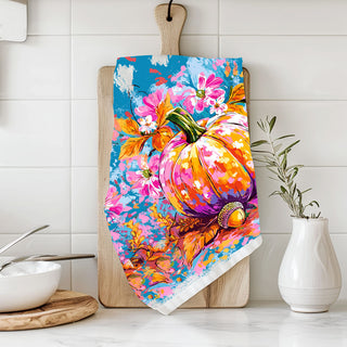 artistic fall kitchen towel with painted pumpkin and florals
colorful boho pumpkin towel for modern farmhouse kitchen
hand painted style pumpkin towel with acorns and leaves
bright fall dish towel with teal blue sky and pumpkin art
bright watercolor style pumpkin towel for cottage kitchen
colorful fall kitchen linen with bold pumpkin print