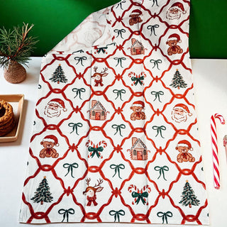 traditional christmas kitchen towel with santa and gingerbread house
festive holiday dish towel with candy canes and reindeer design