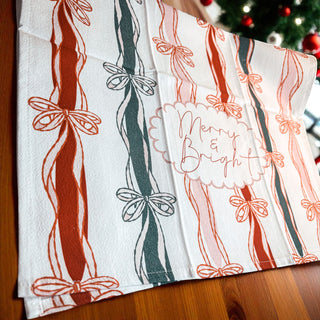 Holiday kitchen towel elegant ribbon pattern
Merry & Bright Christmas kitchen towel with elegant ribbon bow design. 
Christmas kitchen decor towel bow